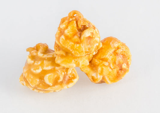 Stacked kernels of caramel-coated popcorn