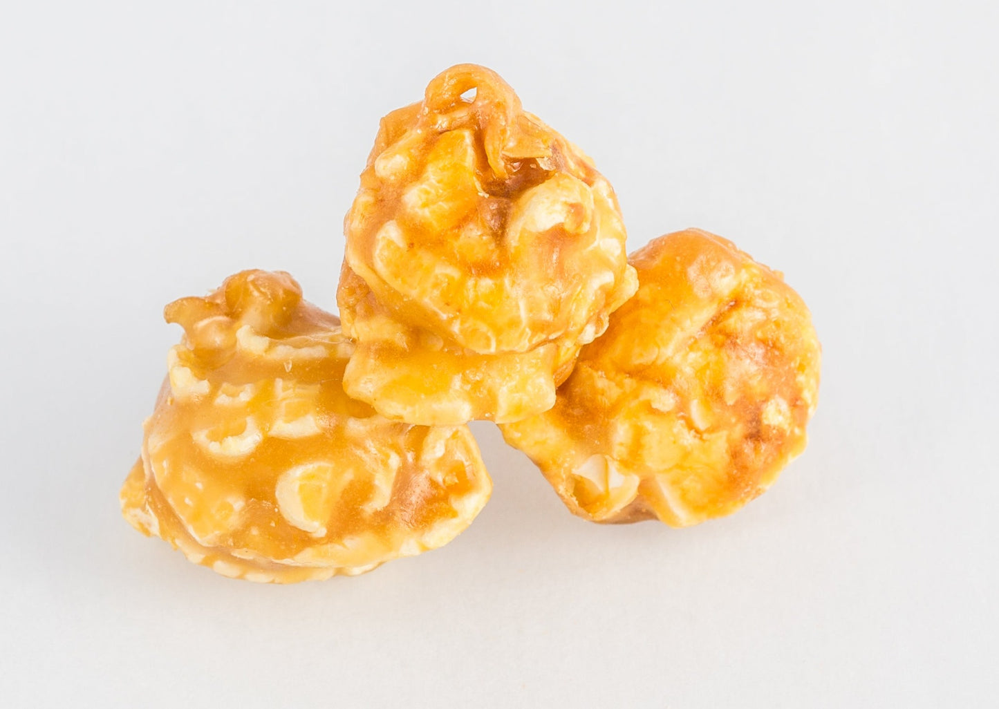 Stacked kernels of caramel-coated popcorn